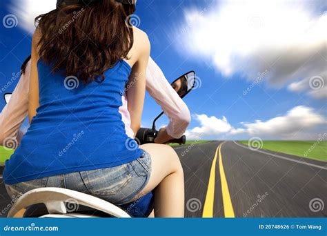 Girls Riding A Motorcycle With High Speed Royalty Free Stock Image