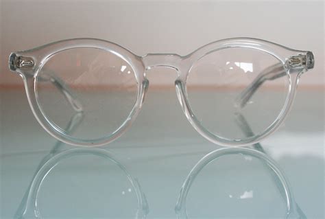 clear round vintage prescription glasses by polaroid with clip on