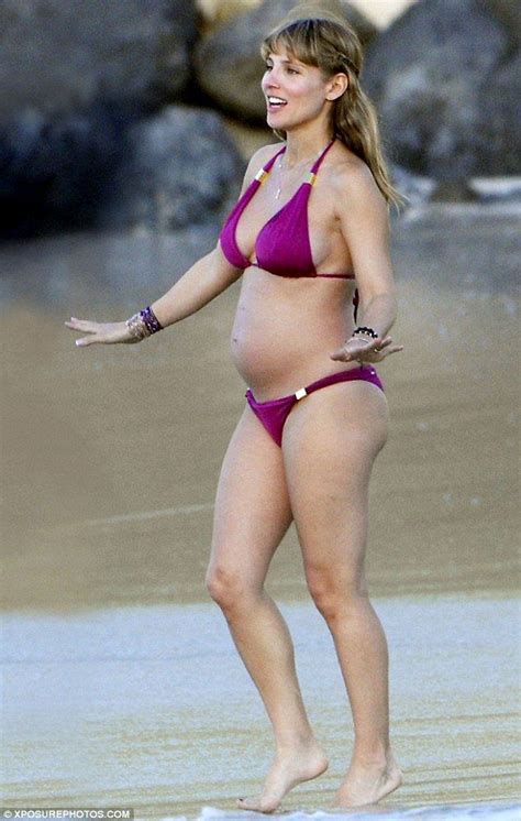 pregnant actress elsa pataky dashes into the ocean to join