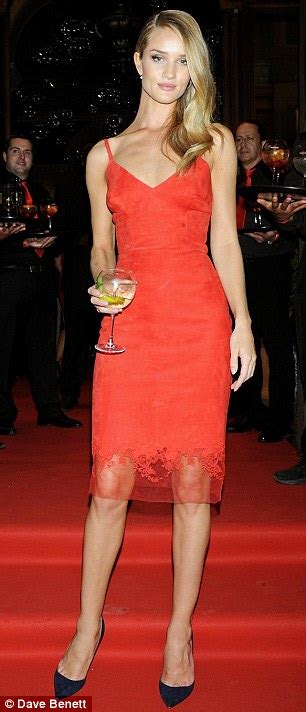 rosie huntington whiteley smoulders in the colour of love in a striking scarlet midi dress at