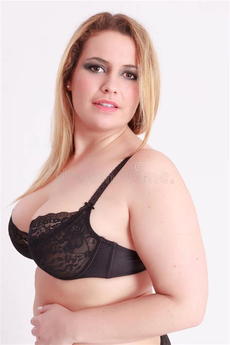 Busty Girl In Bra With Smooth Blond Long Hair Stock Image