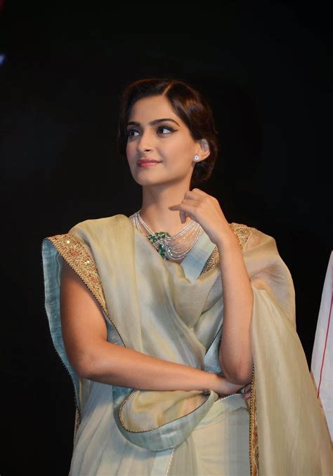 high quality bollywood celebrity pictures sonam kapoor looks super sexy in saree at the artisan