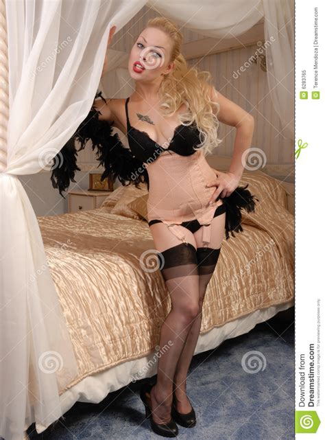Gorgeous Fifties Pinup Girl In Bedroom Royalty Free Stock
