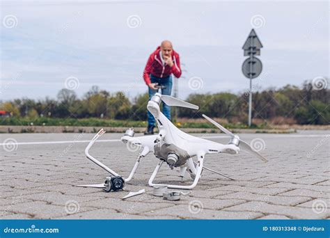 shocked worried man   drone crash destroyed broken drone stock photo image  person