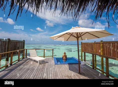 maldives rangali island conrad hilton resort woman  pool  view   ocean