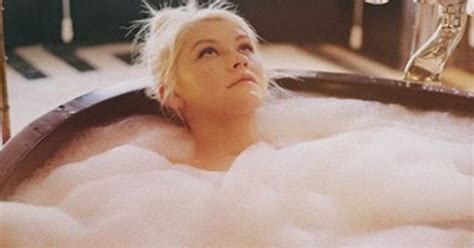 wearing nothing but soap suds christina aguilera stuns in naked snap