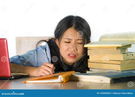 young stressed  frustrated asian korean teenager student working