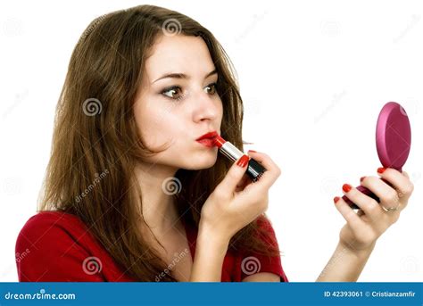 Woman Makes Makeup Applying Pink Lipstick On Lips