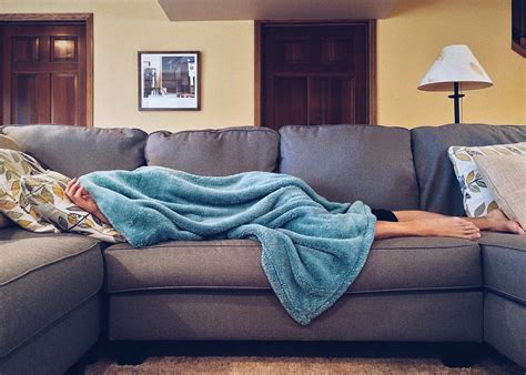 Why Falling Asleep On The Sofa Can Be Bad For Your Health