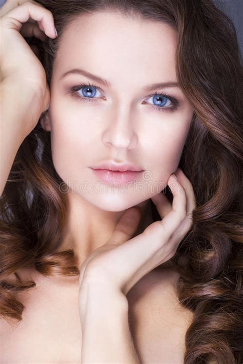 Brunette Woman With Blue Eyes Without Make Up Natural