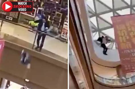 shopping centre fall china man throws girl 6 off balcony before