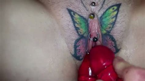 lewd slut with a butterfly tattoo on her pussy just loves