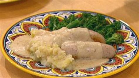 veal bockwurst in a creamy mustard sauce with smashed potatoes