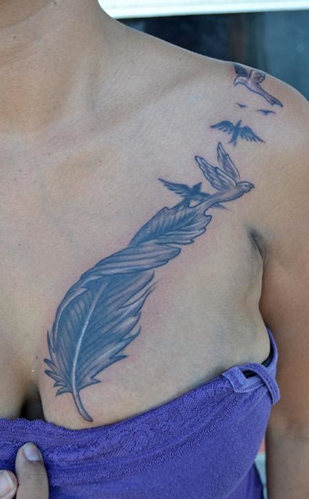 Blue Feather Birds Women Chest Tattoo Nsfw Tattoomagz › Tattoo