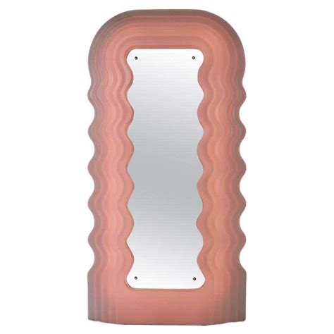 pink ‘ultrafragola mirror designed by ettore sottsass for poltronova