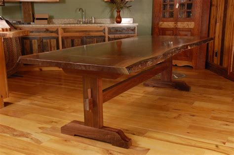 hand   edge walnut slab trestle dining table  corey morgan wood works custommadecom