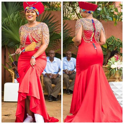 clipkulture zulu bride  red traditional wedding dress isicholo hat