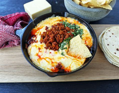 queso fundido with chorizo a skillet of melted mexican