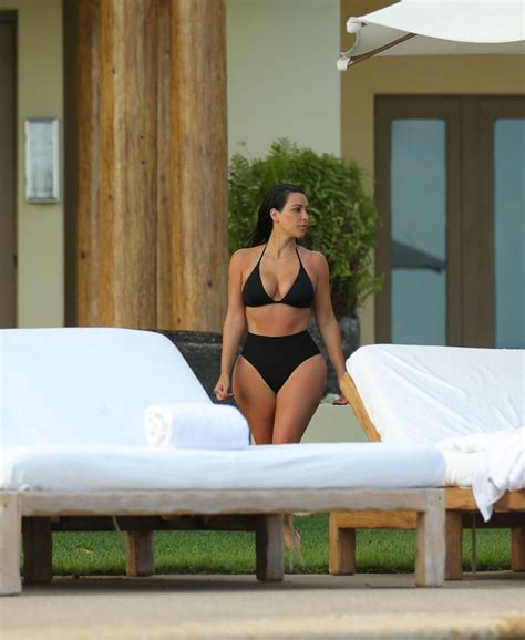 kim kardashian enjoys the pool with wet shirt celebzz