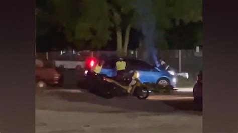 Caught In The Act Couple Flees With Cop On Cars Hood