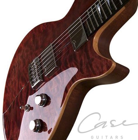 case guitars   brazilian mahogany body deep carved quilted maple