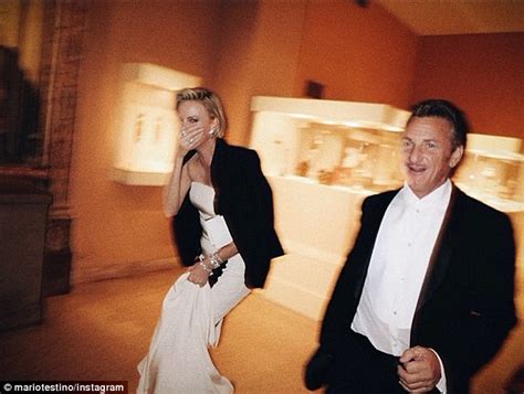 charlize theron and sean penn hold hands after late night