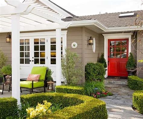 i like the red door with the tan house and white accents