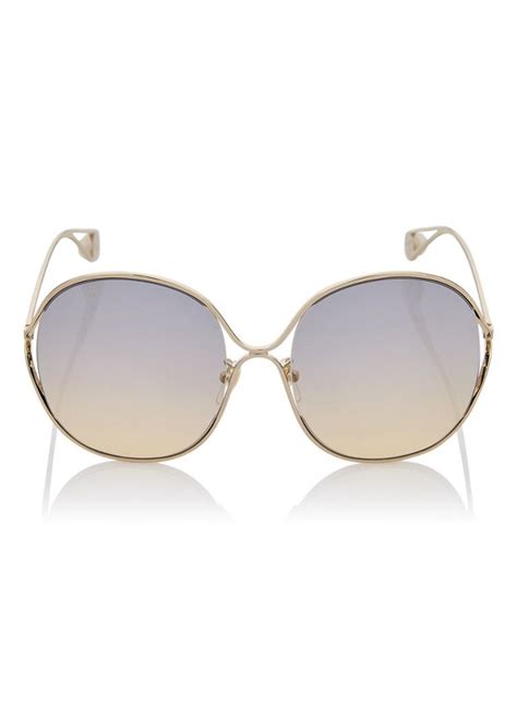 gucci zonnebril ggs de bijenkorf cat eye sunglasses gucci hair accessories style