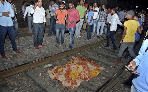 dead  train runs  crowd  india  times  israel