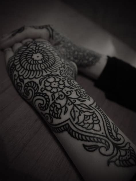 ornamental pattern hand  arm sleeve tattoo  guy le tattooer
