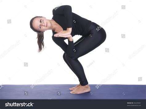 parivritta utkatasana chair twist yoga pose stock photo