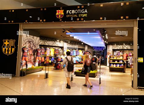 people   barcelona football club fcb shop barcelona airport spain europe stock photo