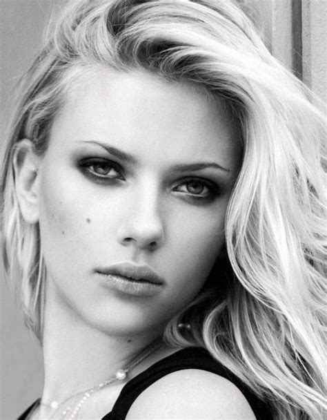 Scarlett Johansson Has Long And Beautiful Blond Hair She
