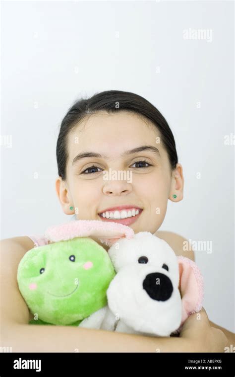teen girl holding stuffed animals portrait stock photo alamy