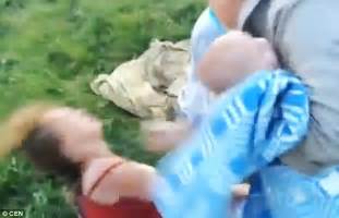 russian mum and grandmother are beaten up by passers by in video daily mail online