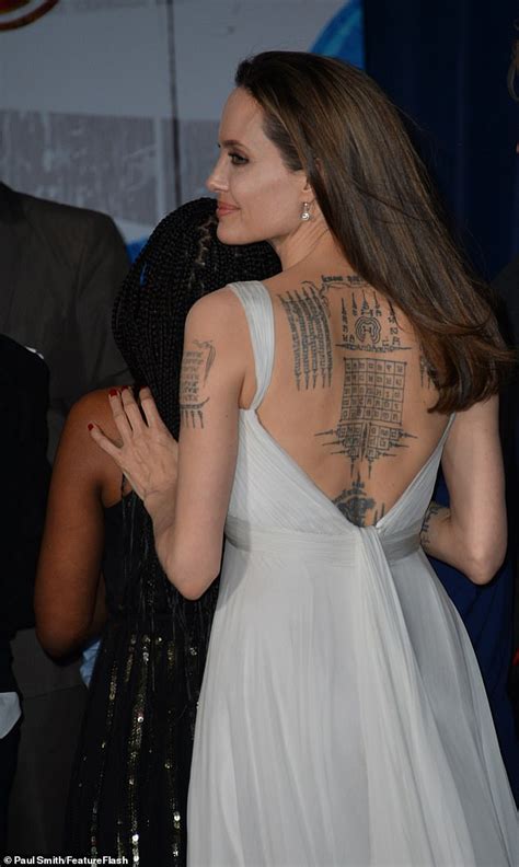 angelina jolie shows off her extensive tattoo collection
