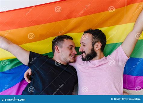 Two Homosexual Men Holding Lgbtq Flag Stock Image Image Of Loving