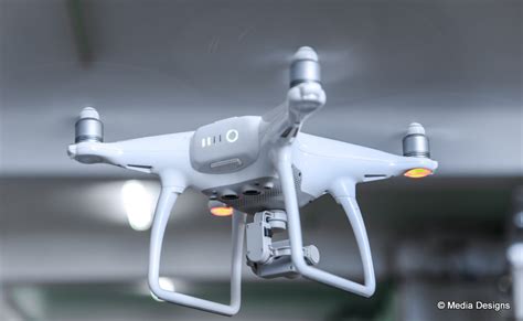 fly drone camera  aerial shots media designs