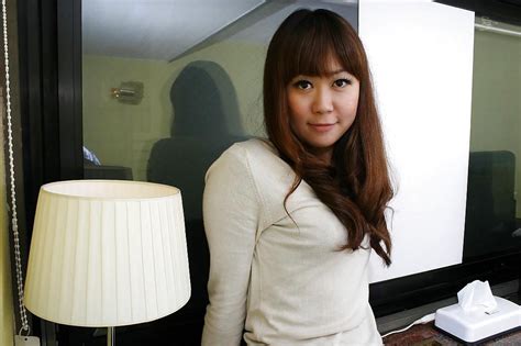 Asian Milf Hiroko Nagatomo Undressing And Spreading Her