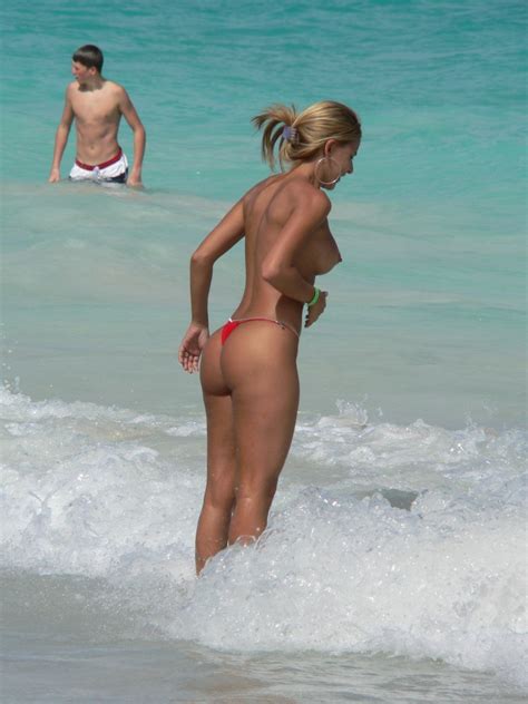 beauty sweet teen topless at the beach wearing just thongs scared of water waves naked girls