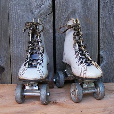 vintage roller skates  metal wheels