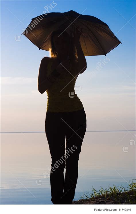 Woman With Umbrella Stock Picture I1742849 At Featurepics