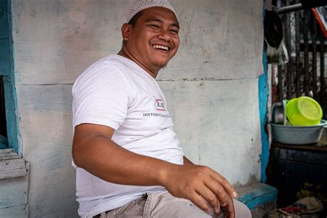 indonesia man   taqiyah smiled cheerfully travel photo