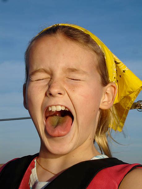 sticking out tongue human tongue teenage girls mouth open