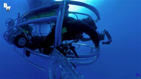 propelled ocean cage  shark diving  scuba divers