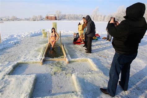 russian orthodox christians celebrate epiphany by taking a dip in icy