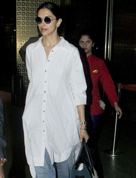 Deepika Sported A Casual Look In White Long Shirt And Denims As She