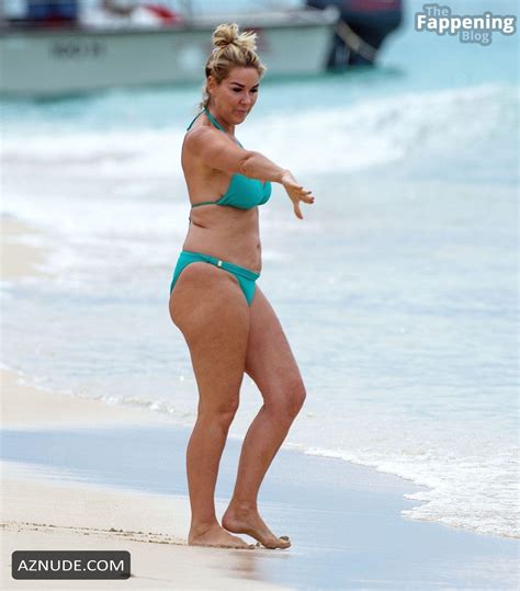 claire sweeney sexy seen at the beach wearing a hot blue bikini in