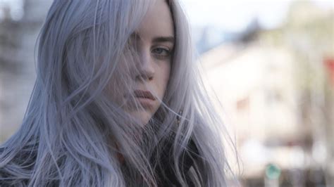 billie eilish  facing  side  white color hair standing  blur background hd