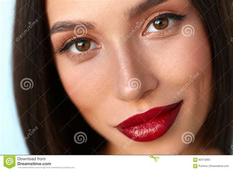 woman with beauty face and beautiful makeup and red lips stock image